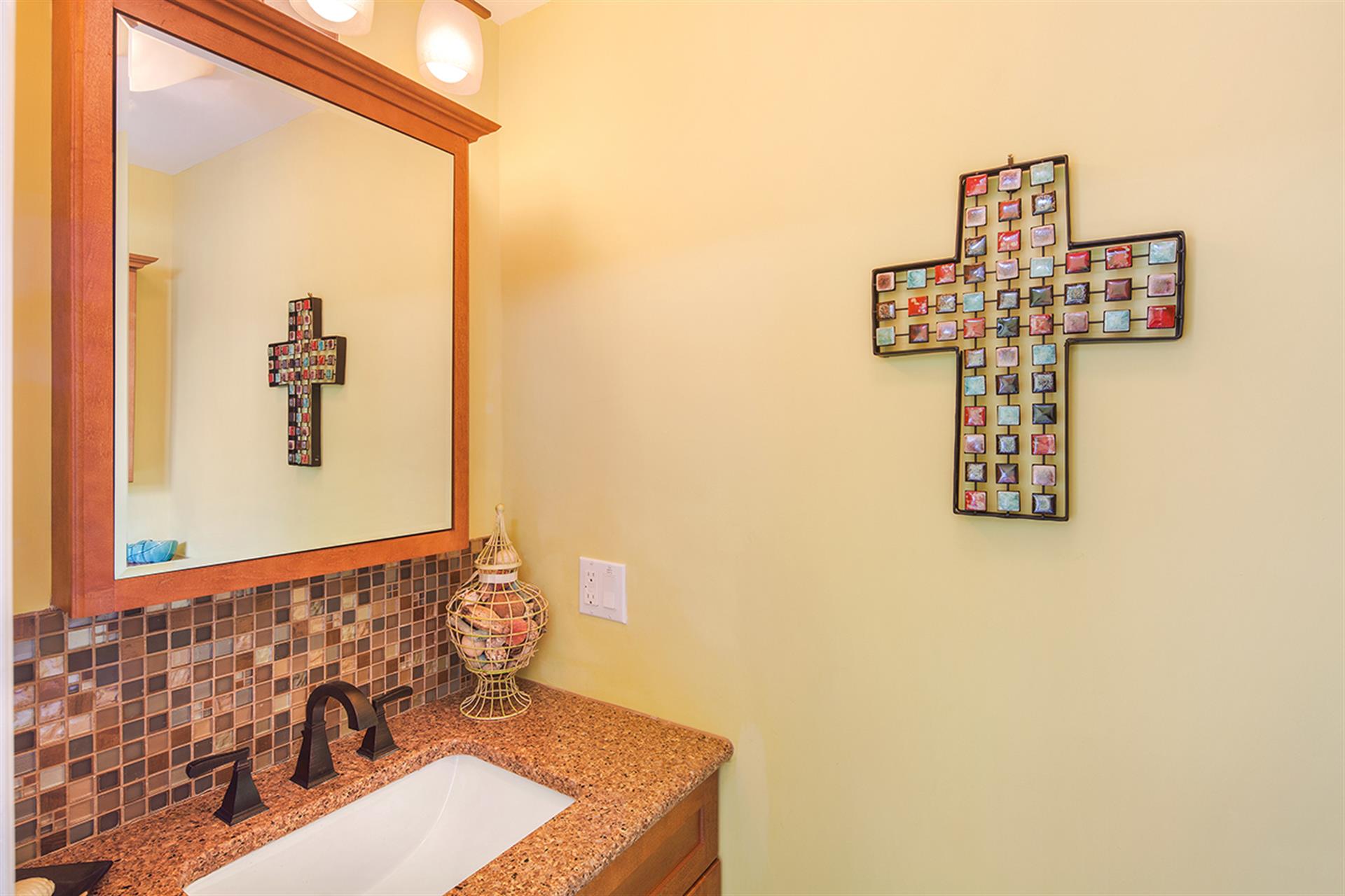 Gorgeous half bath in pool house.