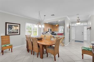 Dining area and peninsula seating make hosting a cinch