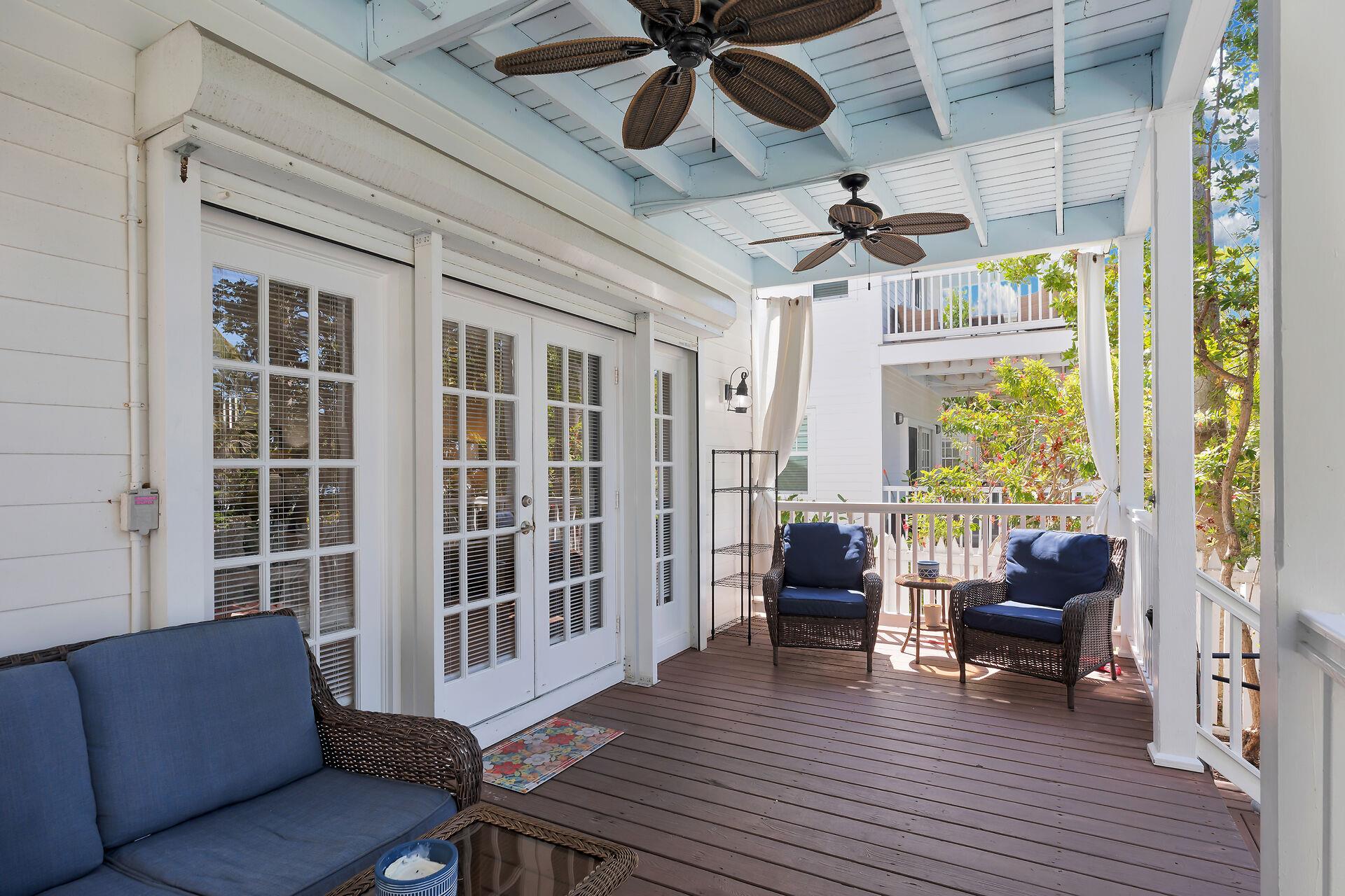 Enjoy Gulf breezes from the covered porch.