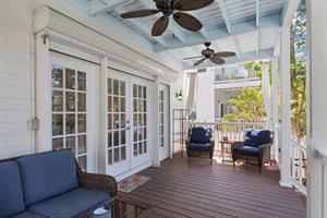 Enjoy Gulf breezes from the covered porch.