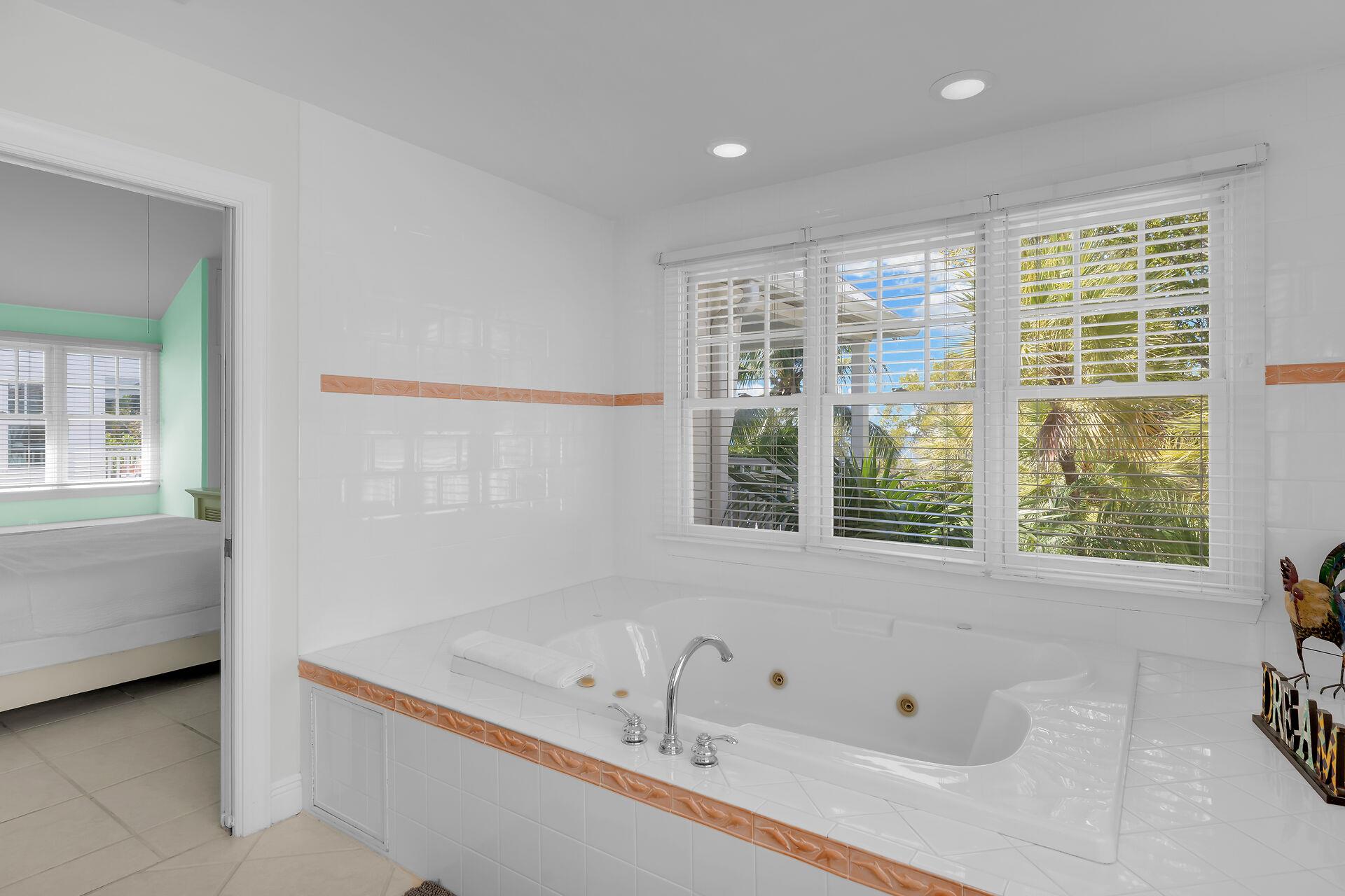 Primary bath with jetted soaking tub.