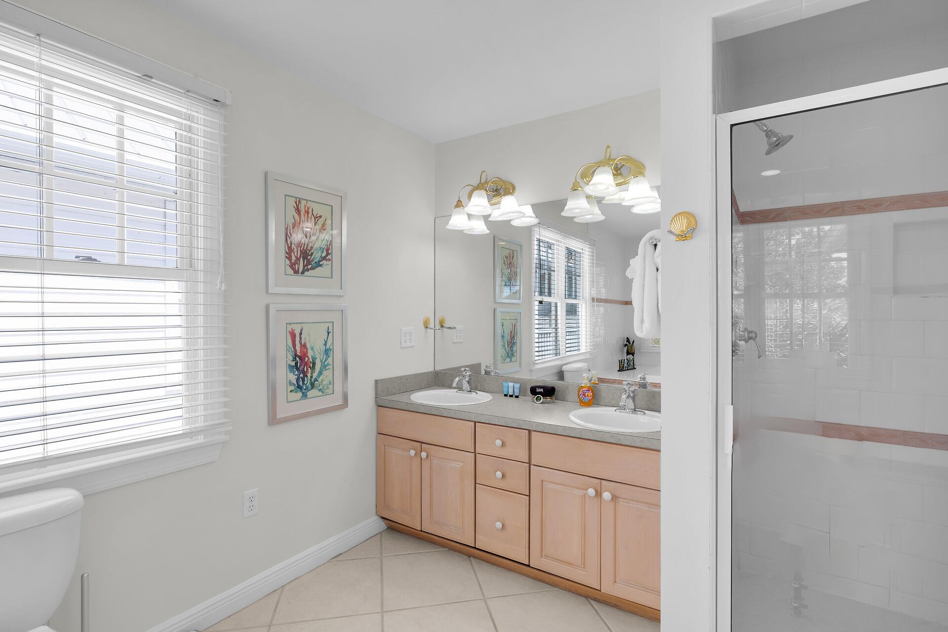 Double sinks and walk in shower in primary bath