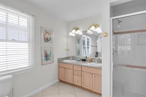 Double sinks and walk in shower in primary bath