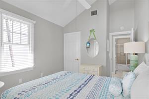 Guest room has closet and vaulted ceiling