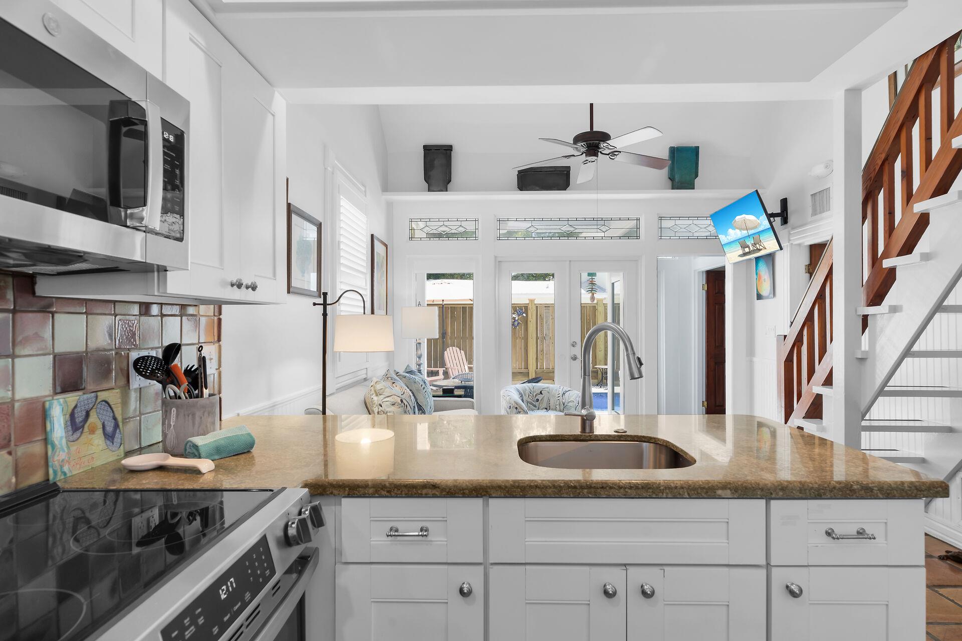 Peninsula with sink, storage, and seating