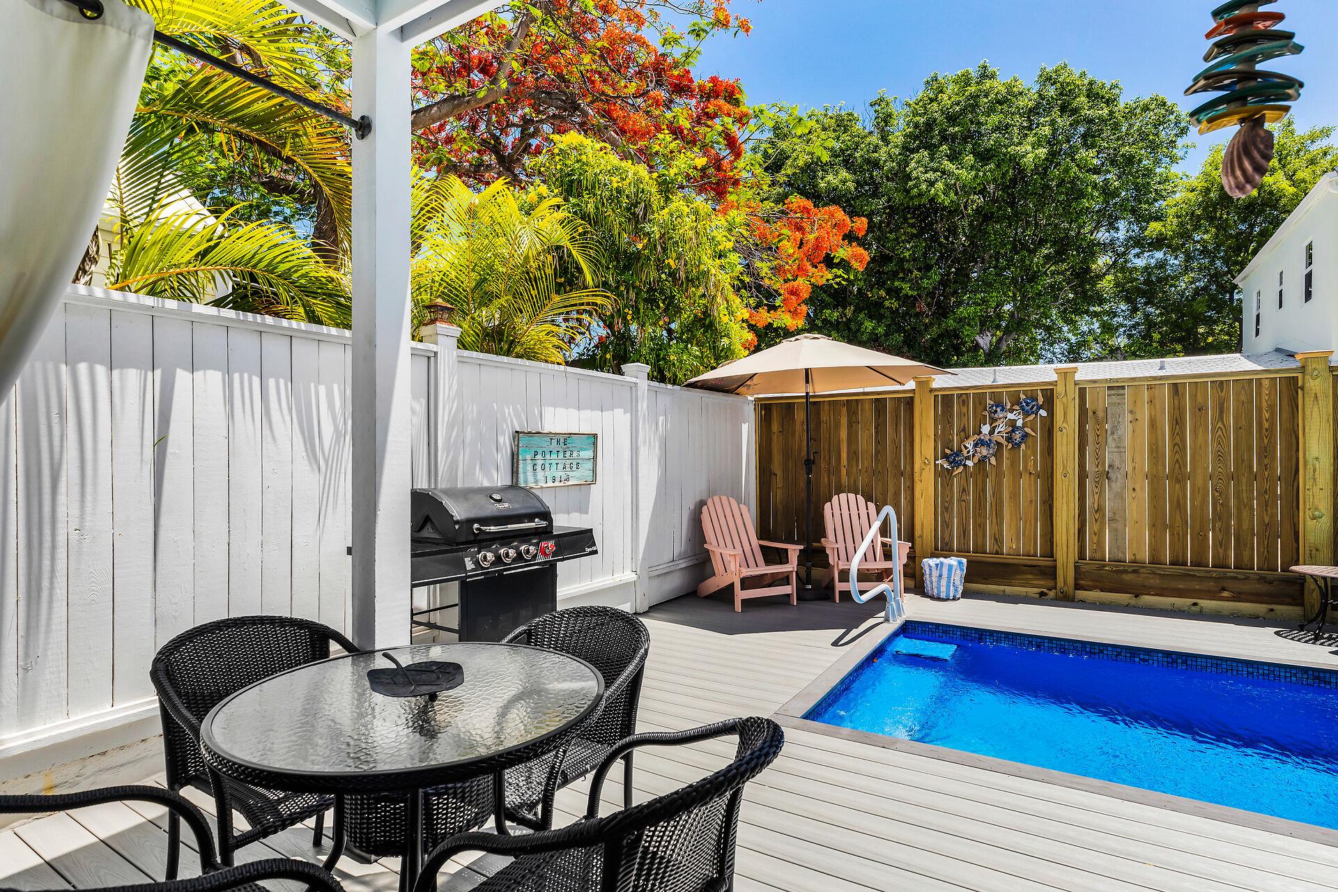 Outdoor grill, dining table and cocktail pool