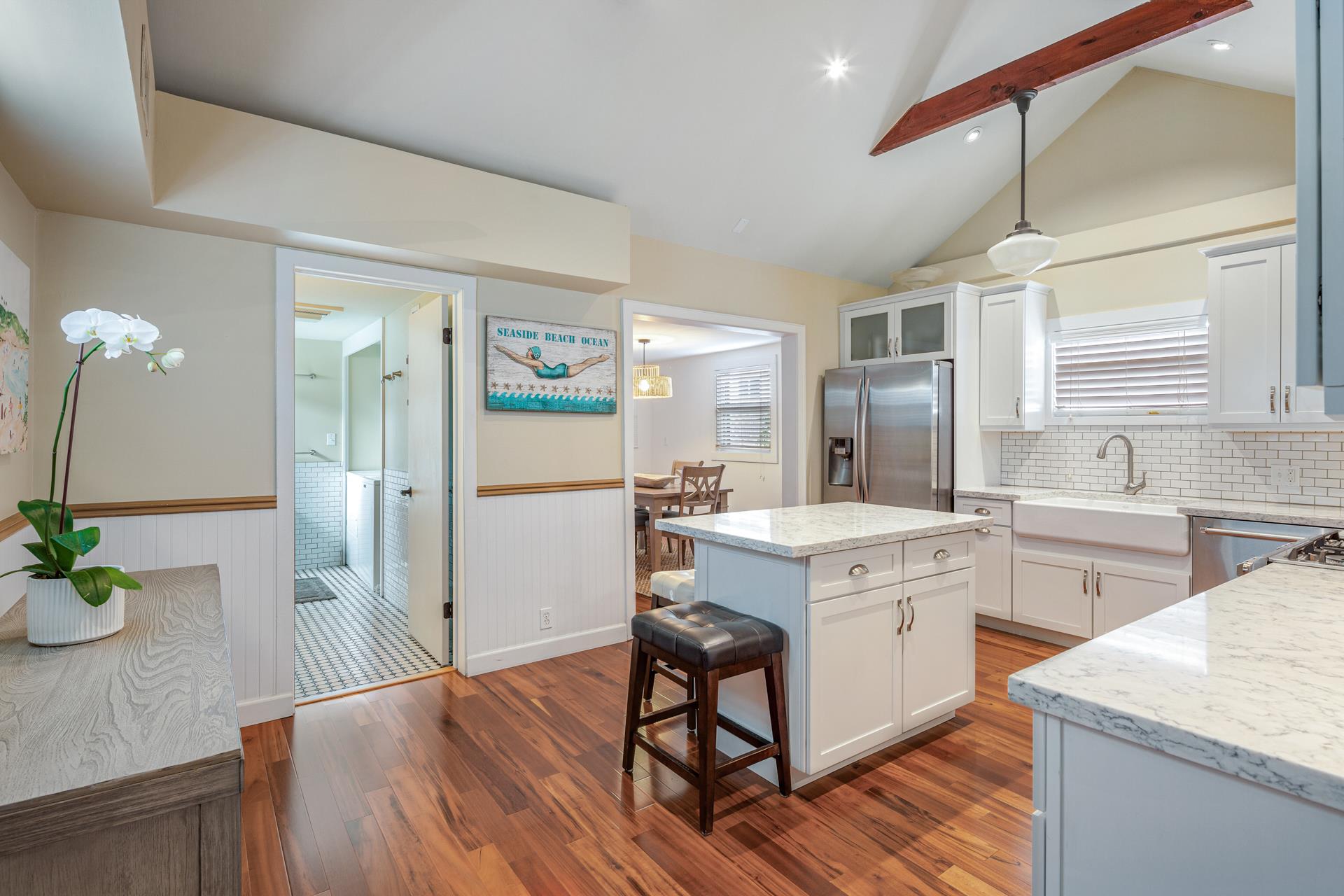 Beautiful kitchen with farm sink and island.