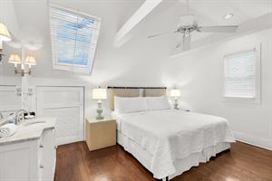 Bedside lighting, ceiling fan and comfy king bed