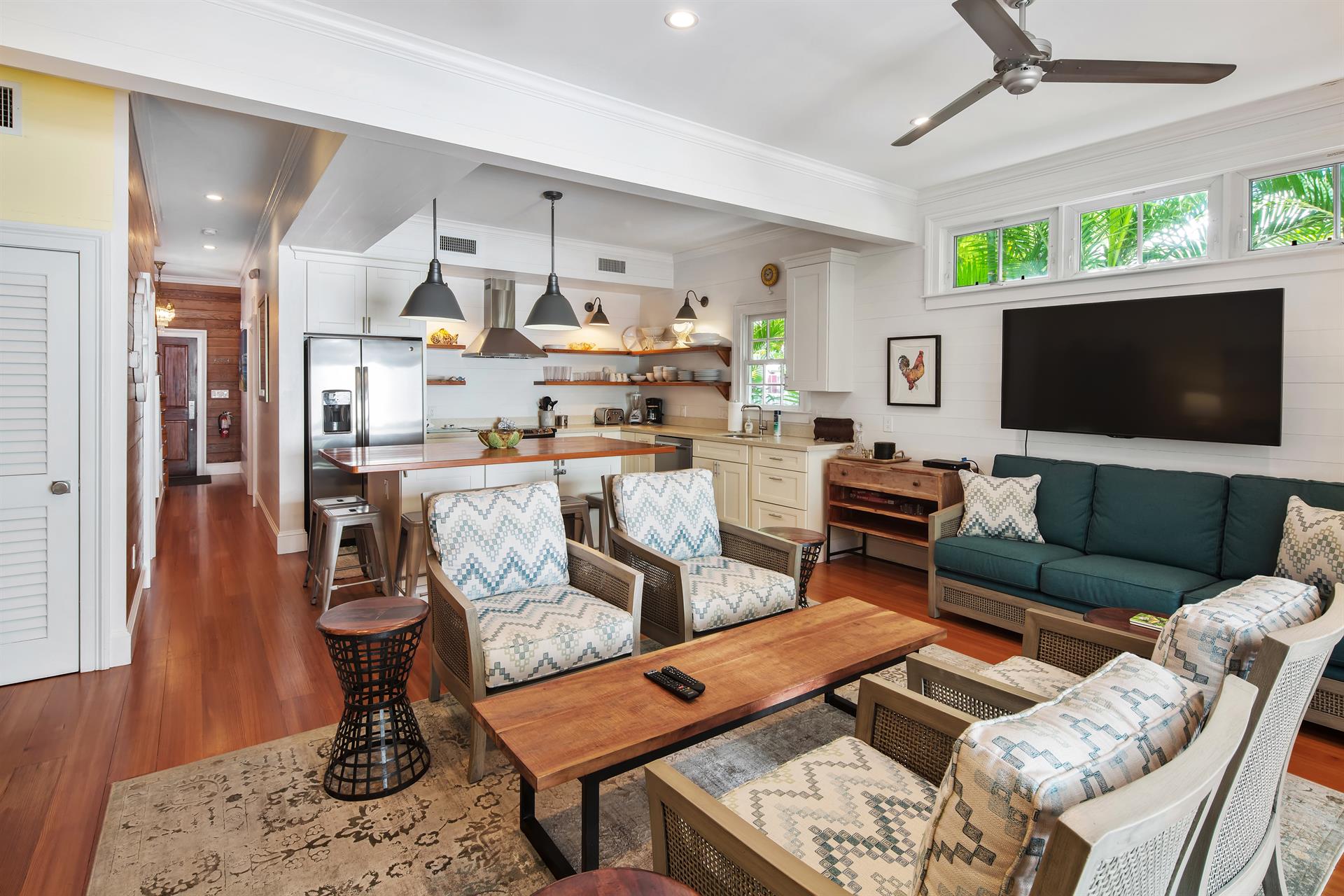 Living area offers ample seating and has a large TV