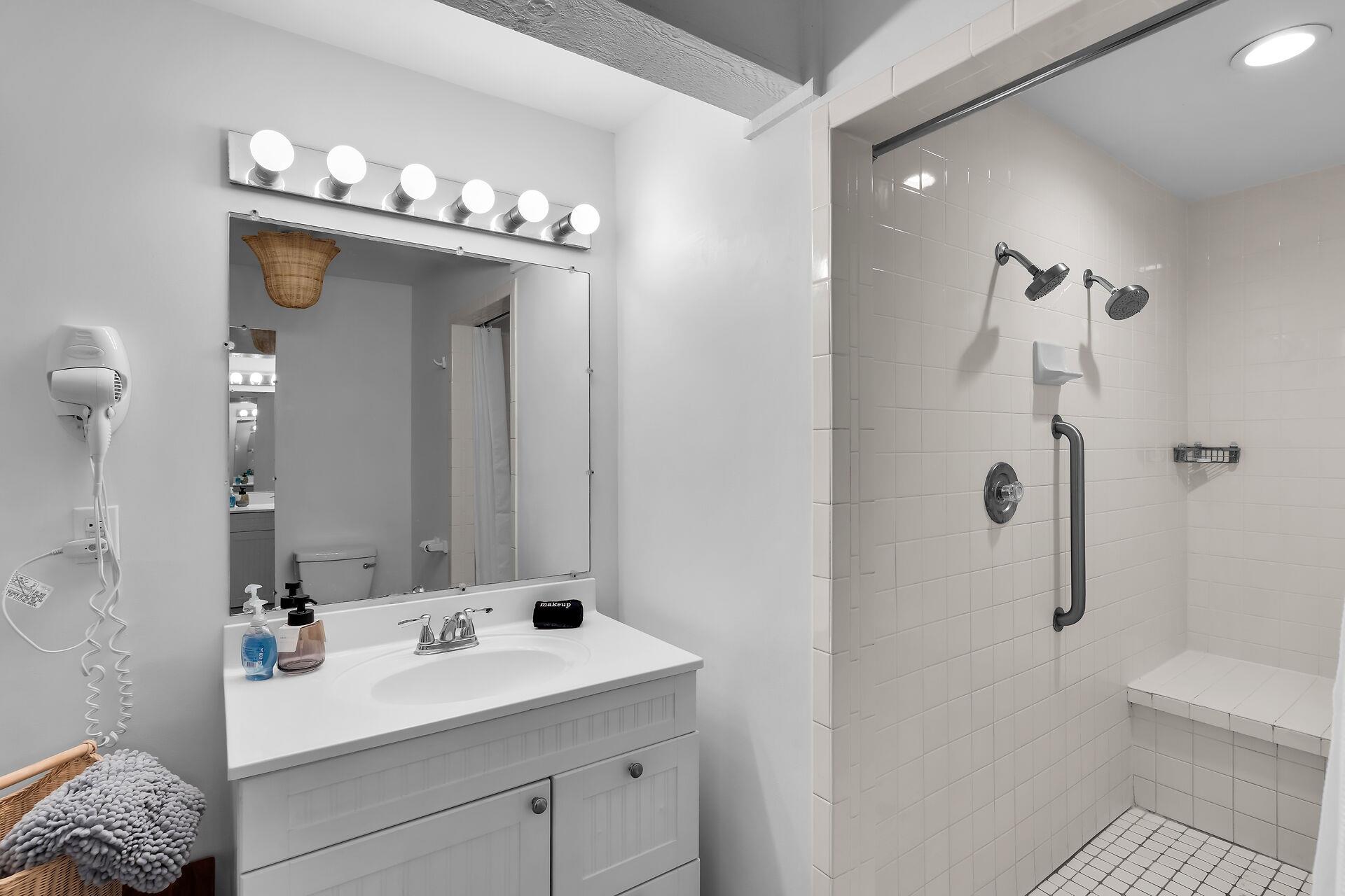 The full bath has a tiled walk in shower.