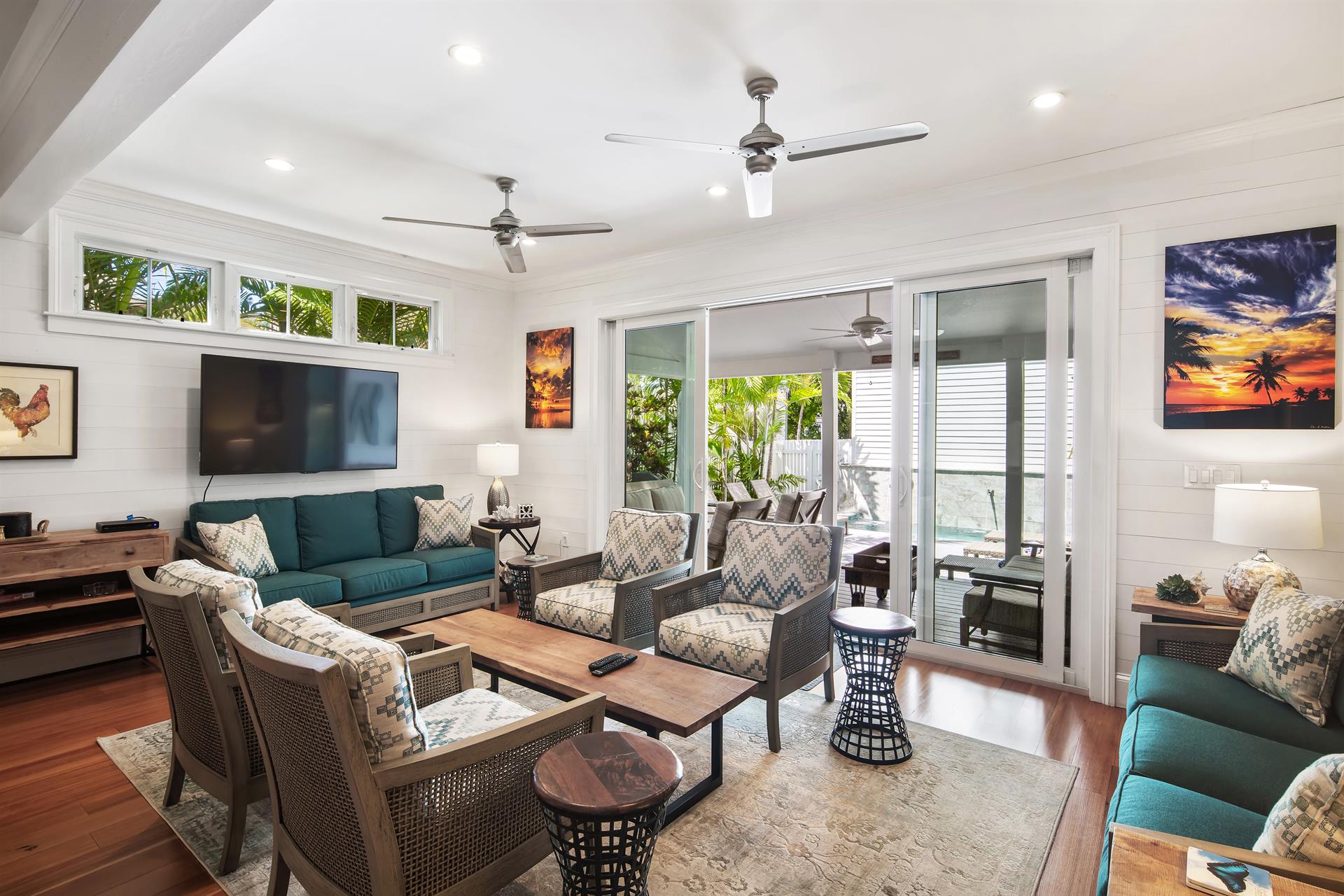 Living area offers access to back porch and pool