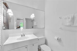 The full bath has a tiled walk in shower.