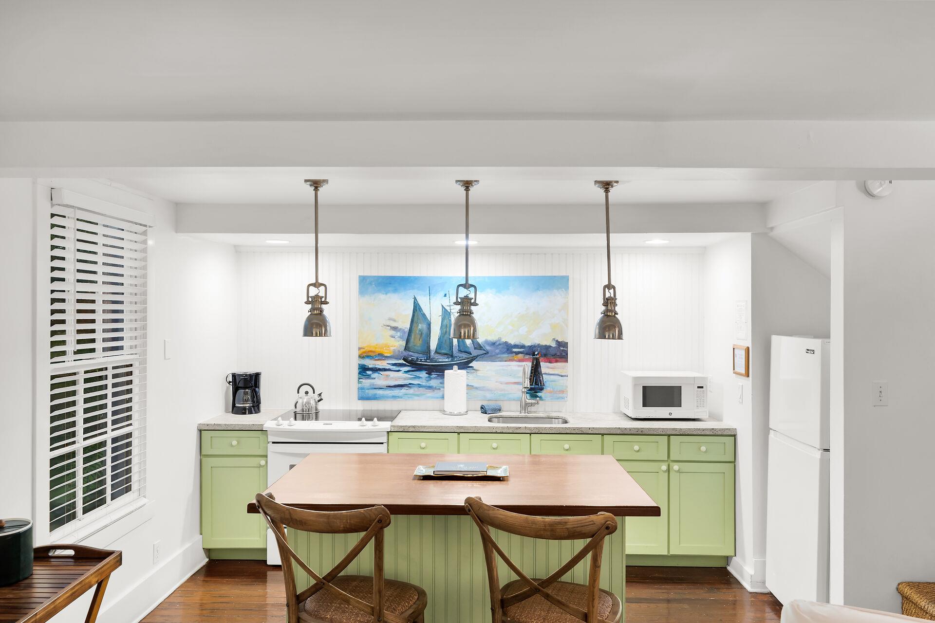 Kitchen and island with seating.