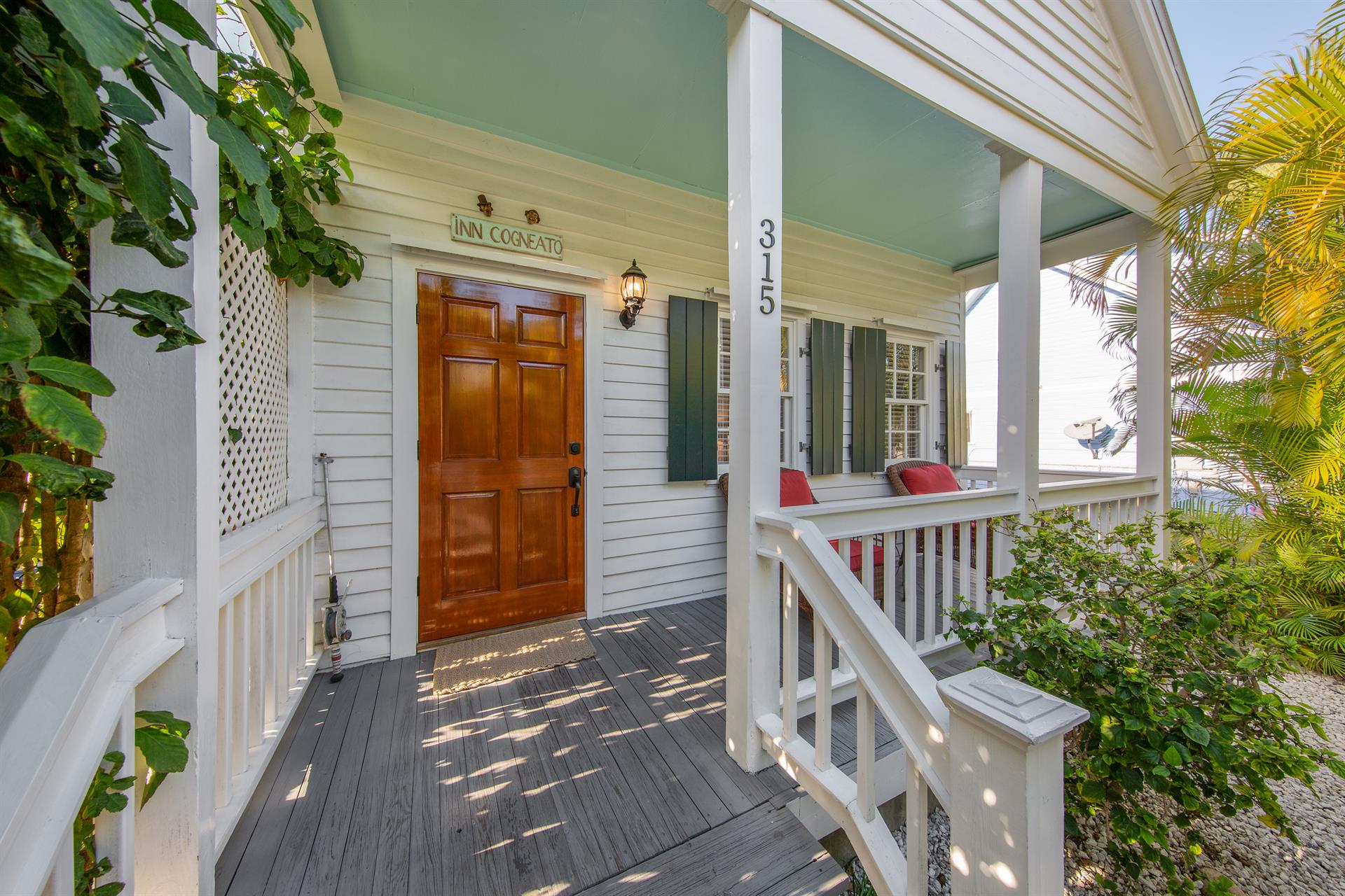 Step up onto the perfect Bahama Village porch