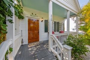 Step up onto the perfect Bahama Village porch