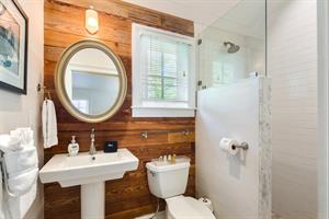 Ensuite bath with Dade County pine and tiled walk in shower