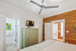 King bedroom also includes dresser, closet, and TV