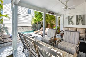 Cool off on the covered lanai with plenty of seating