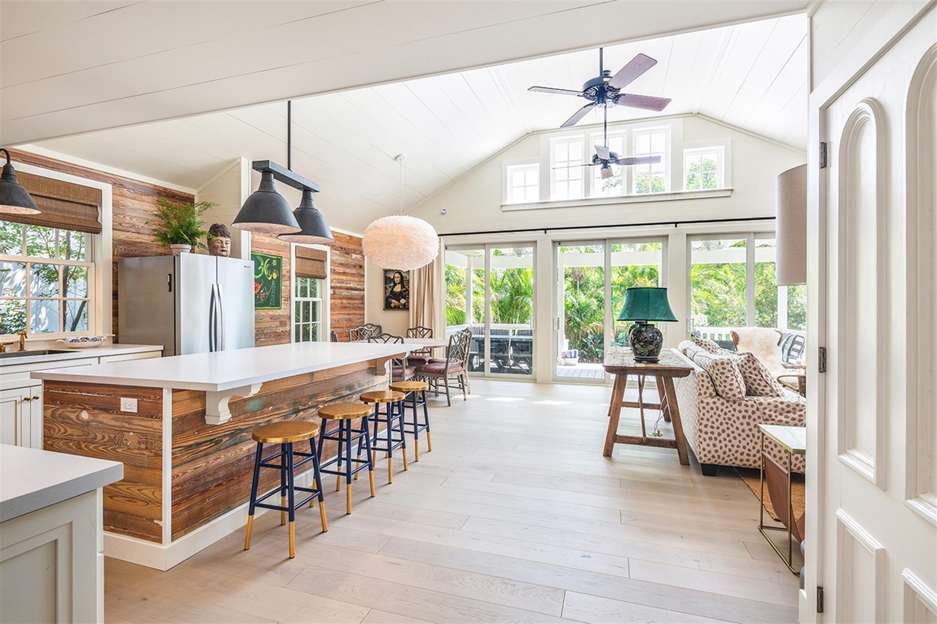 Open concept living and dining in this gorgeous vaulted room
