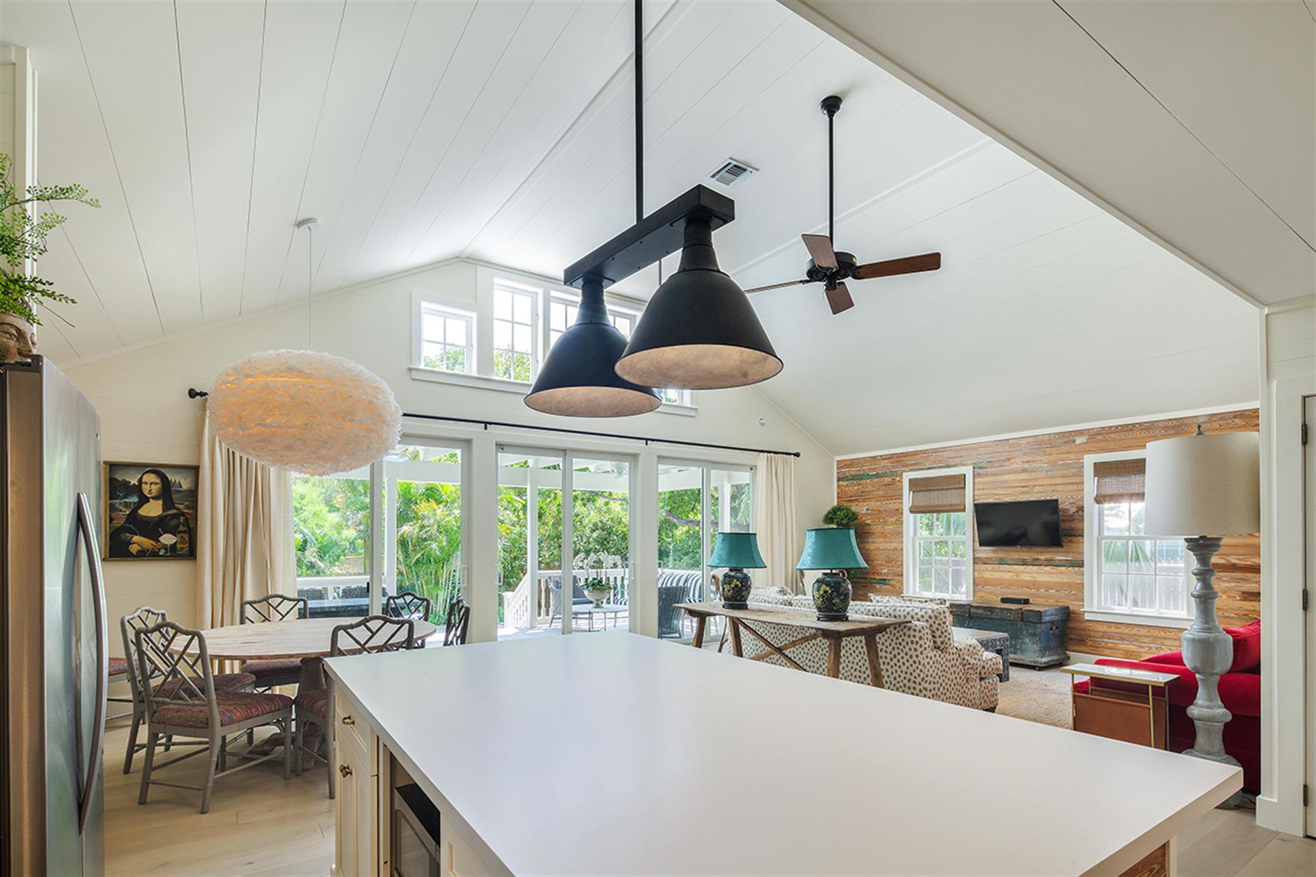 Amazing vaulted ceilings and large doors bring sunlight inside.
