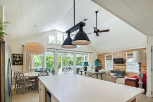 Amazing vaulted ceilings and large doors bring sunlight inside.