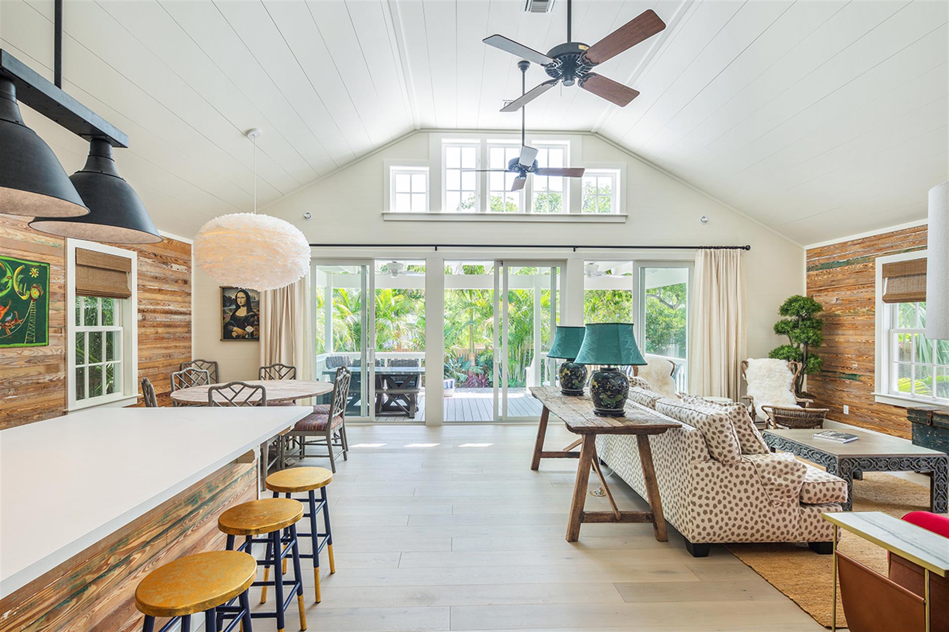 The kitchen and living room flow into the gorgeous backyard