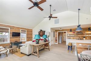 Beautiful decor, Dade Co. pine abound in this gorgeous home