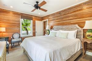 Youre going to love the Dade Co. pine walls and lush bedding