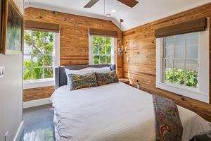 Plenty of sunlight in this beautiful upstairs queen bedroom.