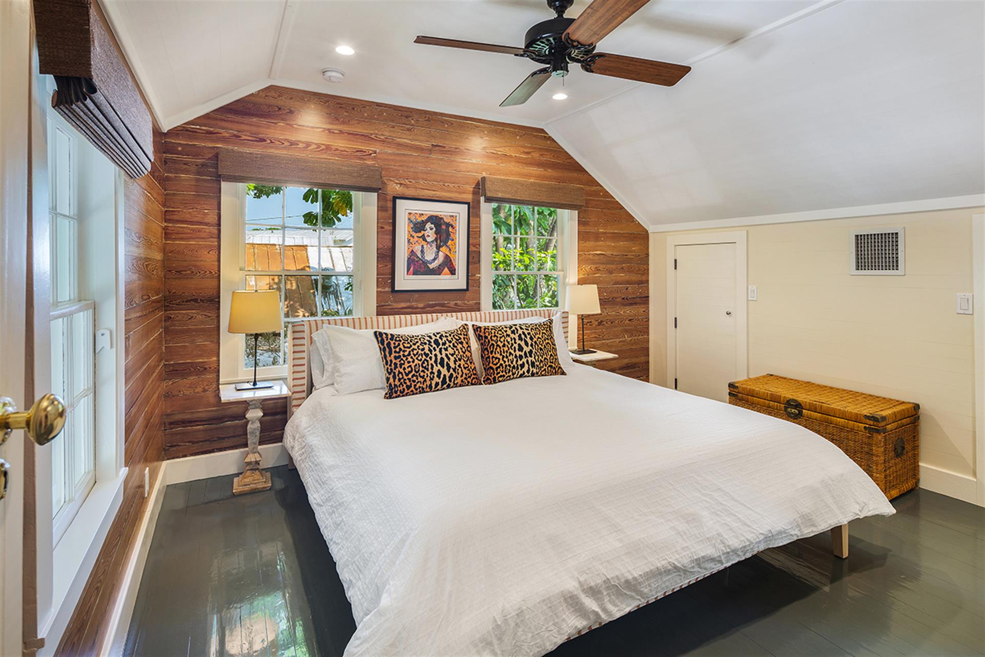 The upstairs king bedroom is a sensual treat with crisp linens.