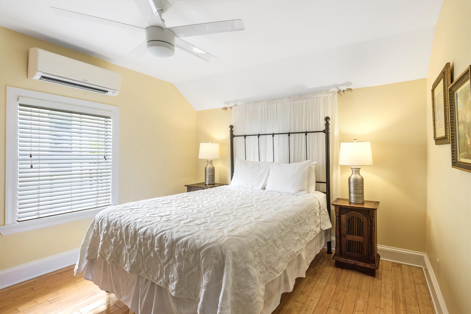 Comfy king size bed. note former queen bed in picture