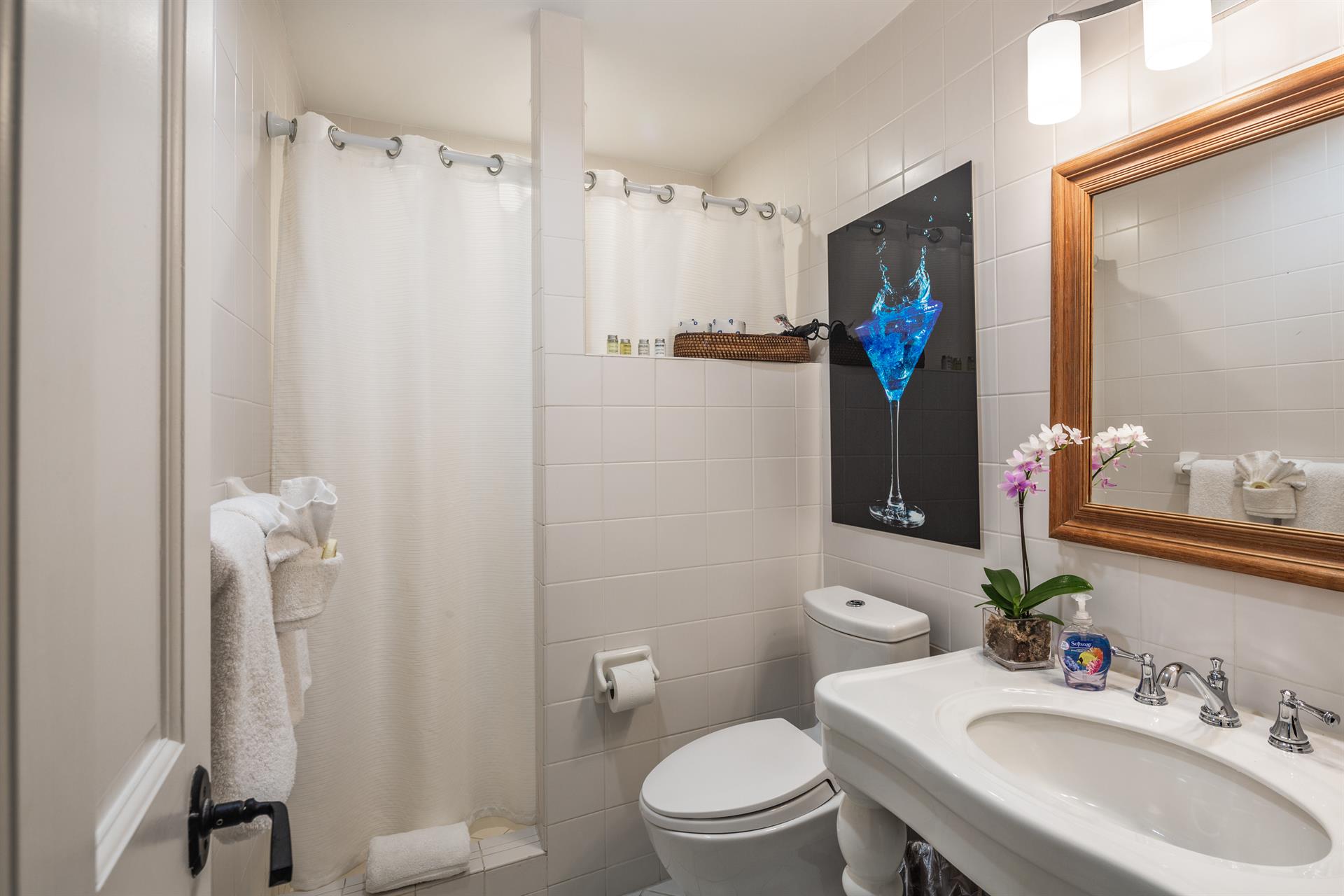 Spacious walkin shower.