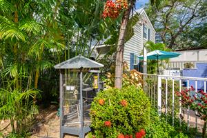 This lush complex even has its own resident birds