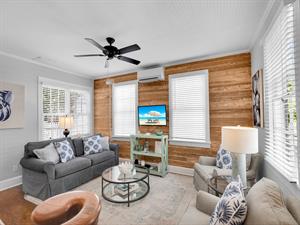 Spacious living area with Dade Co. pine walls.