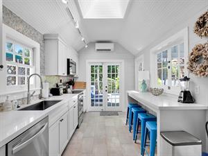 Updated kitchen with counter seating.