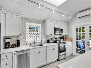 Beautiful kitchen with stainless steel appliances.