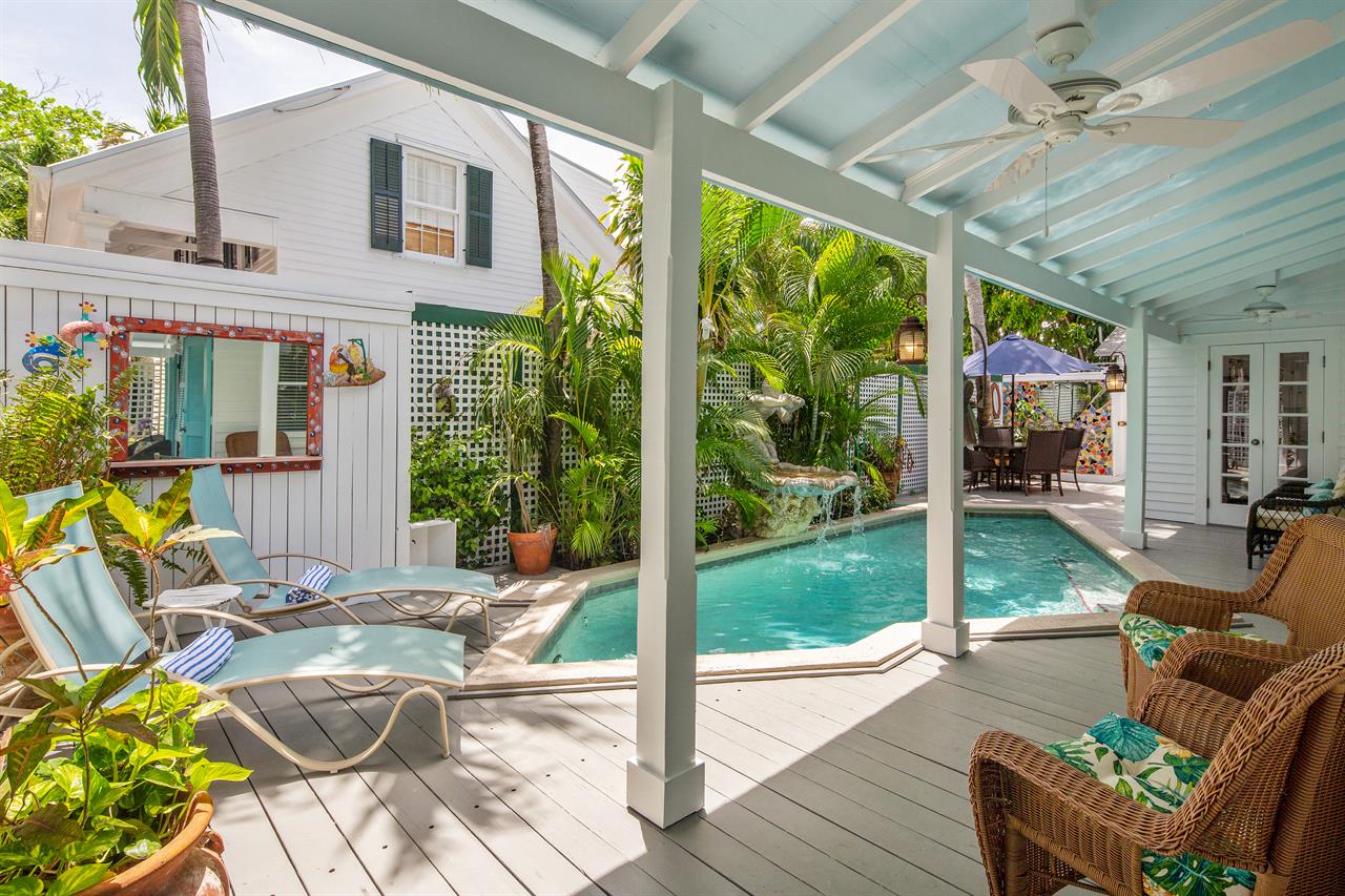 Covered outdoor area with ceiling fans