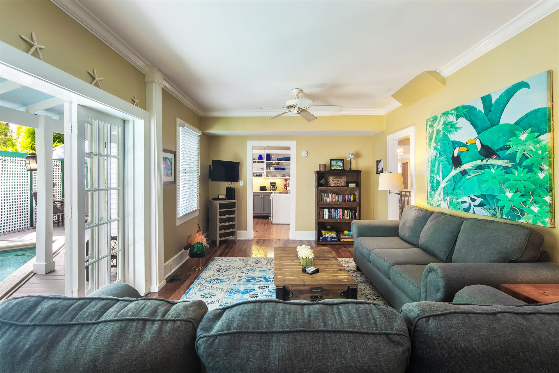 French doors lead to the stunning pool area
