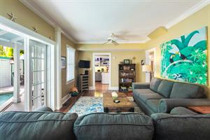 French doors lead to the stunning pool area