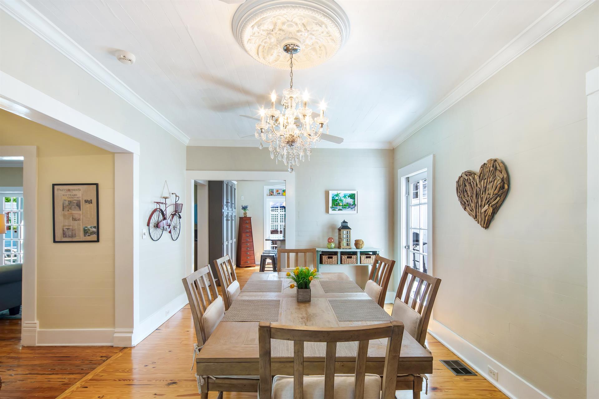 Formal indoor dining room with gorgeous chandelier lighting
