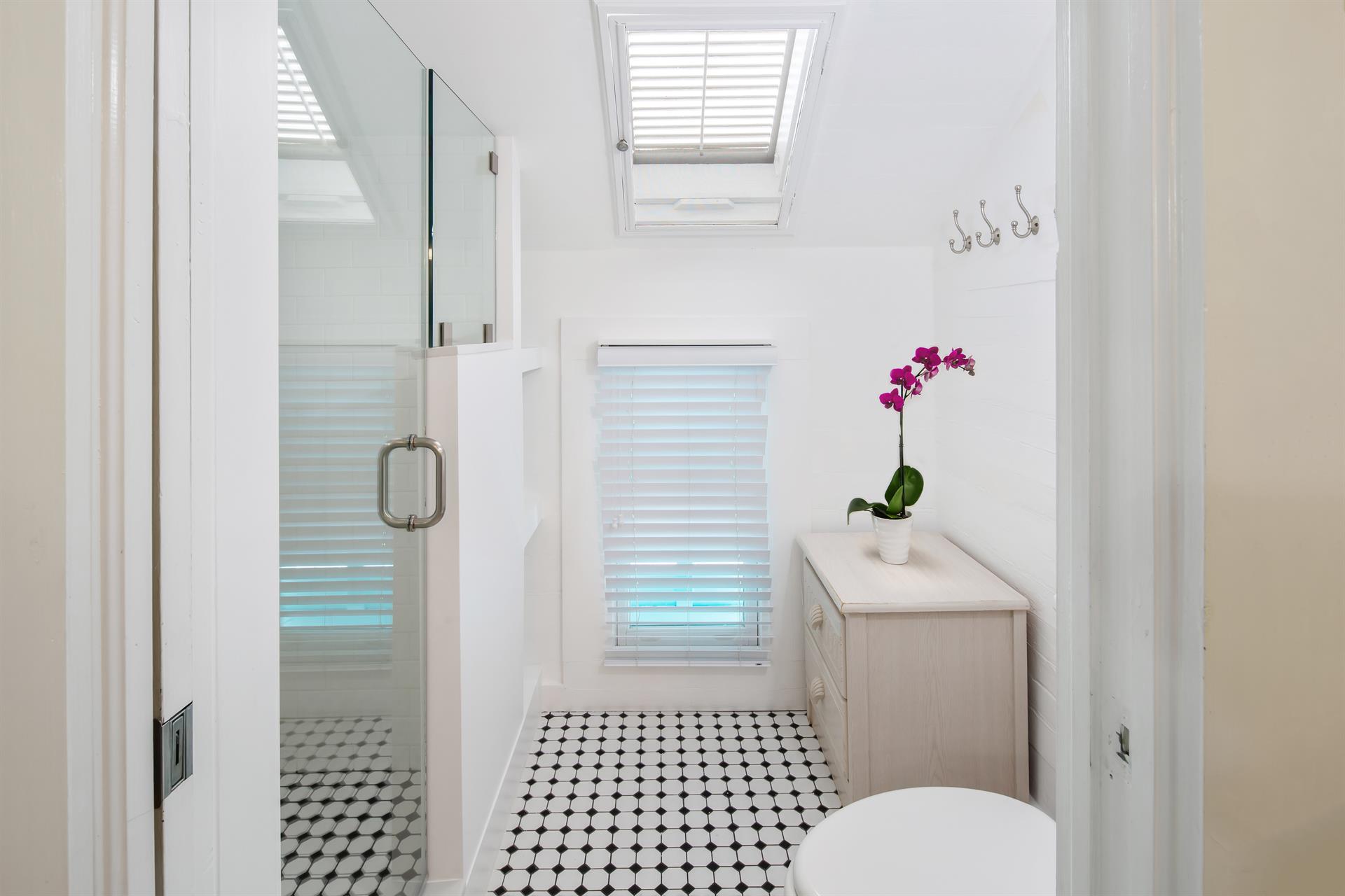 Shared bathroom with walk in shower