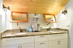 2nd floor shared bath with dual sinks.