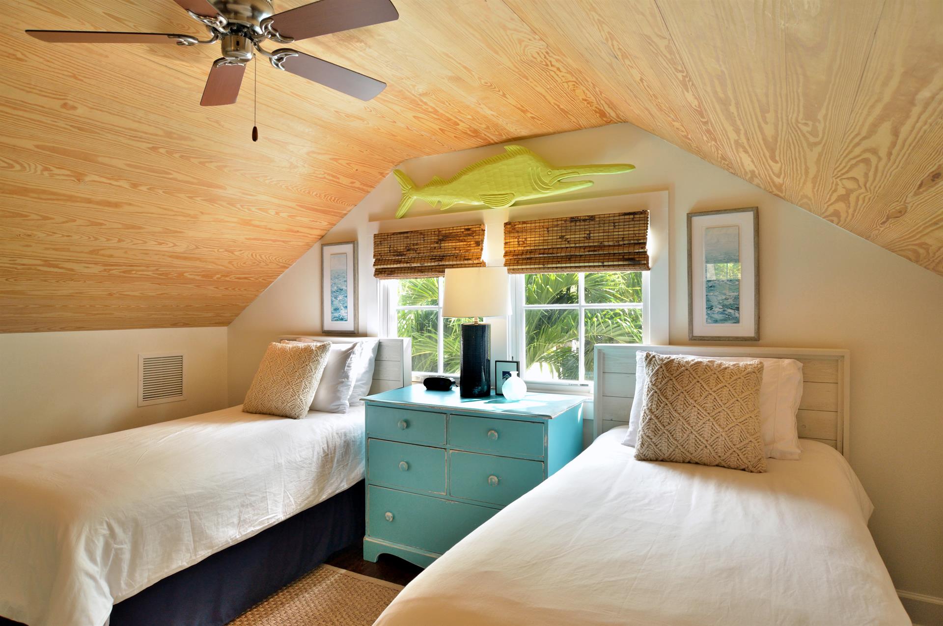 Charming twin bedroom with natural light.
