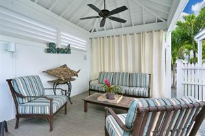 Private breezy poolside cabana for relaxing.