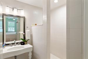 Spacious walkin shower.