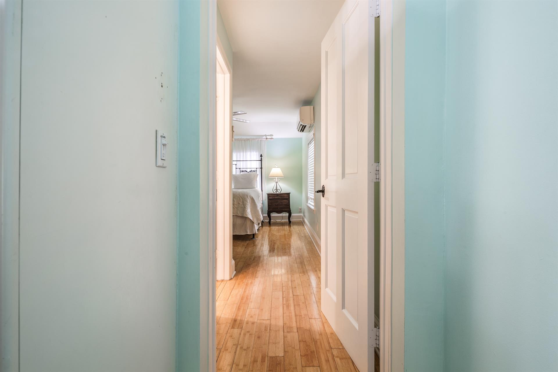 Step up to the bedroom with ensuite bath.