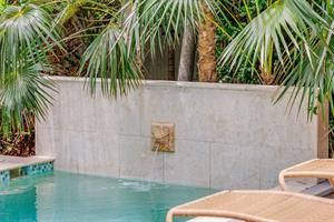 Relaxing water feature in your private pool.