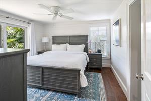 King bedroom with ensuite and access to pool area.