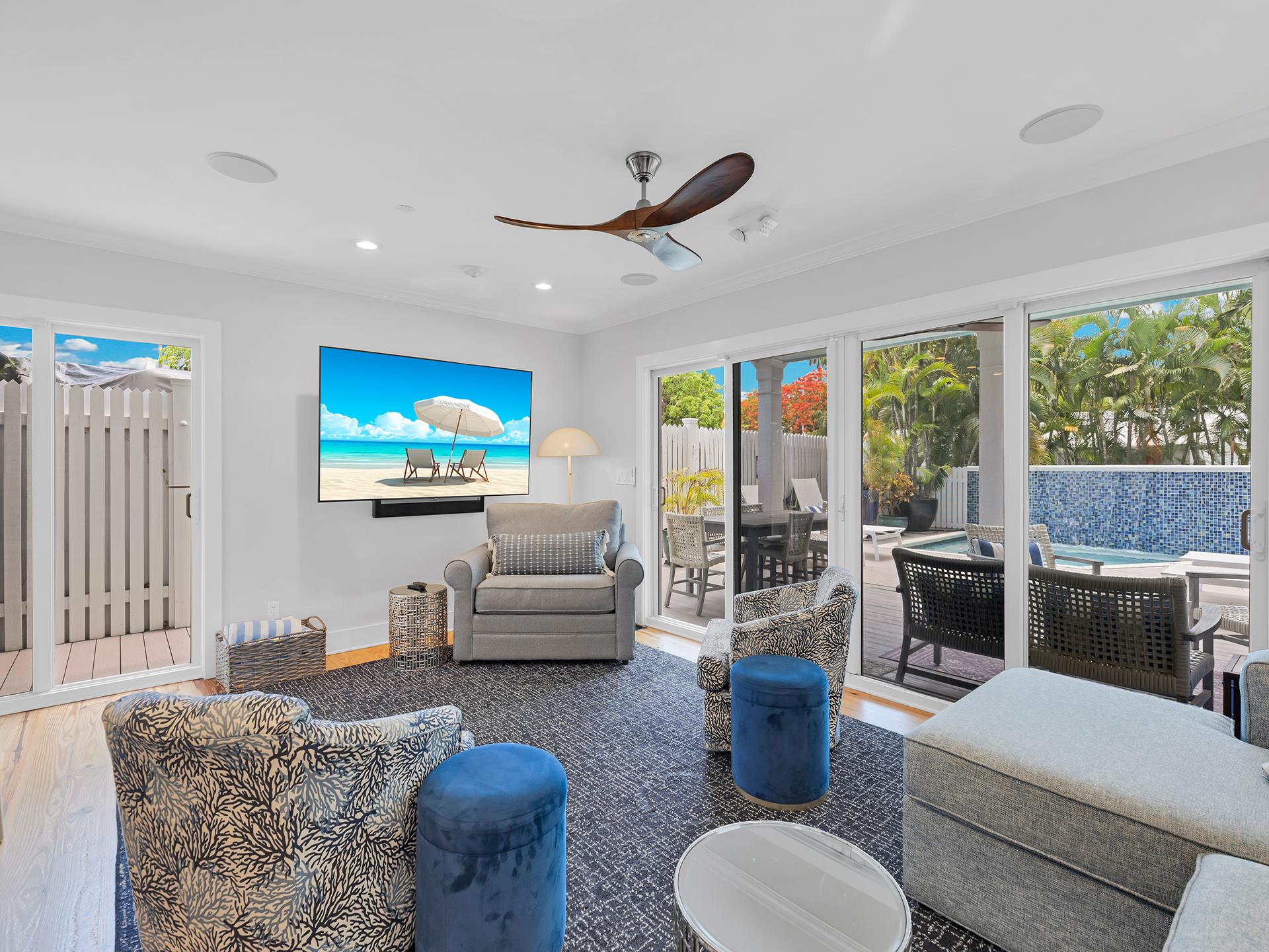 This space spills onto the deck and pool area.