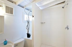 The bath is brightened by natural light.